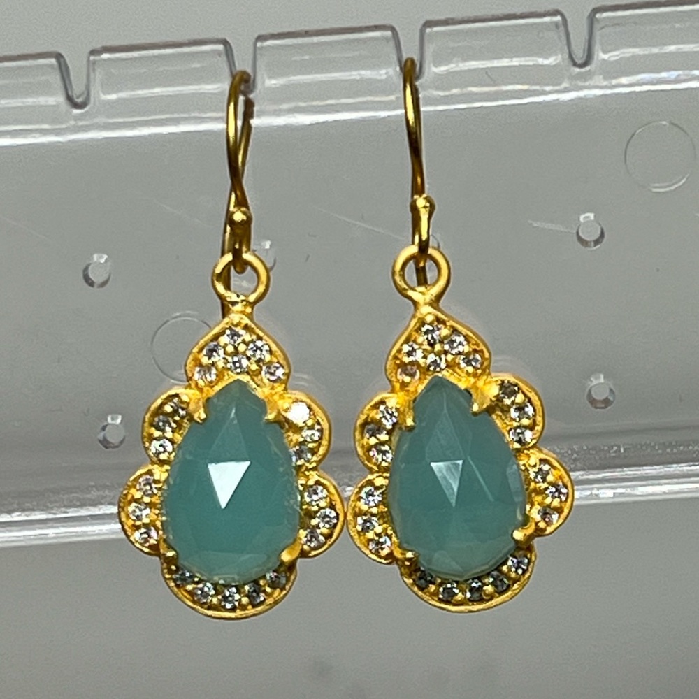 Gold Earrings with zirconium and green stone.